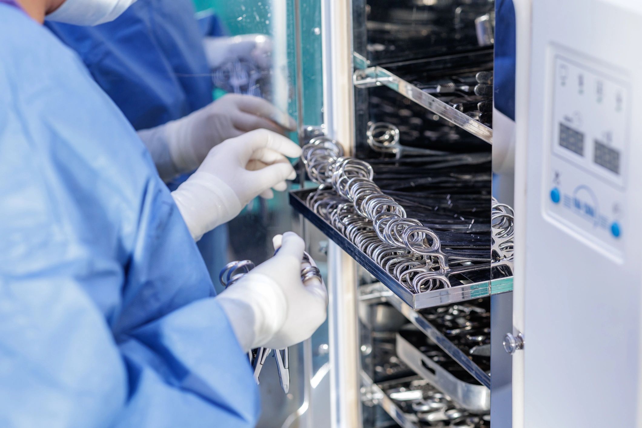 Sterile surgical tools being prepared for medical use